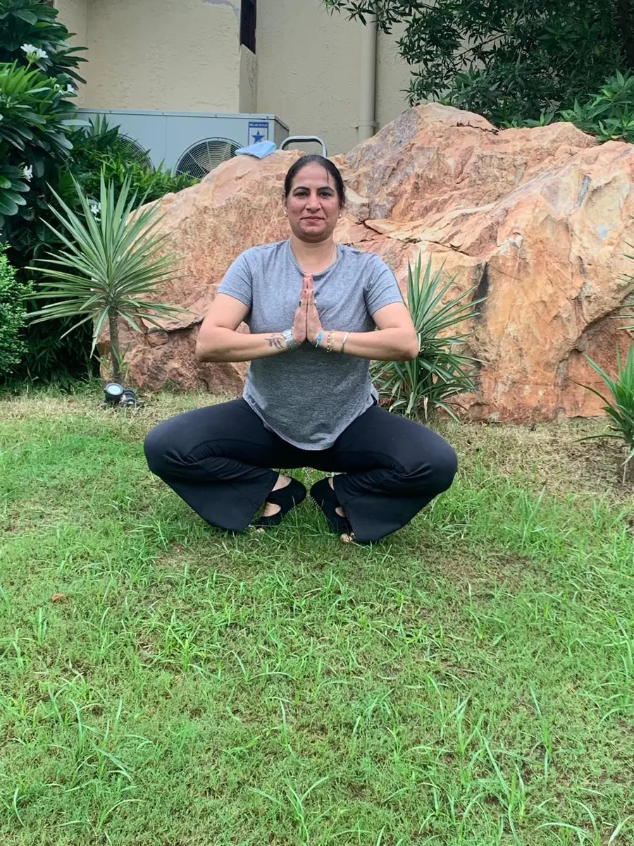 Dr. Ruchi Vats demonstrating a yoga posture