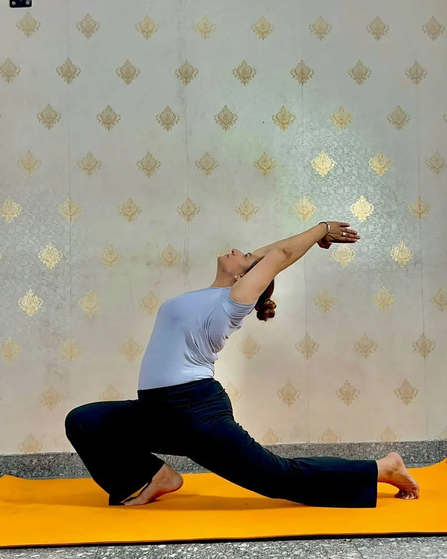 Dr. Ruchi Vats in a guided yoga pose